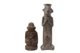 TWO PACIFIC FIGURATIVE STATUES