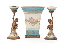 A METAL MOUNTED POTTERY VASE AND PAIR OF CANDLESTICKS
