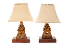 A PAIR OF BRASS LAMPS ON WOODEN BASES