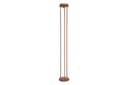 A METAL FLOOR STANDING CANDLE HOLDER