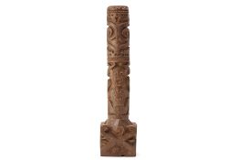 A TRIBAL CARVED WOOD TOTEM POLE