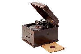 AN ‘HIS MASTER’S VOICE’ GRAMOPHONE & 4 RECORDS