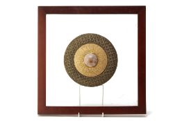 A FRAMED BRASS AND HARDSTONE DIAL