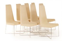 A SET OF EIGHT LIGNE ROSET DINING CHAIRS