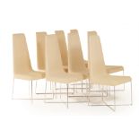 A SET OF EIGHT LIGNE ROSET DINING CHAIRS