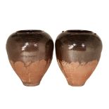 A PAIR OF LARGE TERRACOTTA JARS