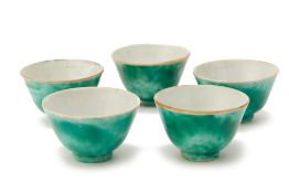 FIVE GREEN GLAZED SMALL TEA BOWLS OR WINE CUPS