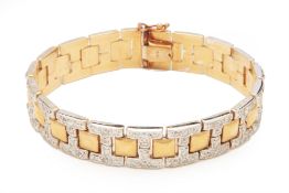 AN ITALIAN WHITE AND YELLOW PAVE DIAMOND BRACELET