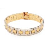 AN ITALIAN WHITE AND YELLOW PAVE DIAMOND BRACELET