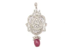 A CABOCHON RUBY AND DIAMOND PENDANT