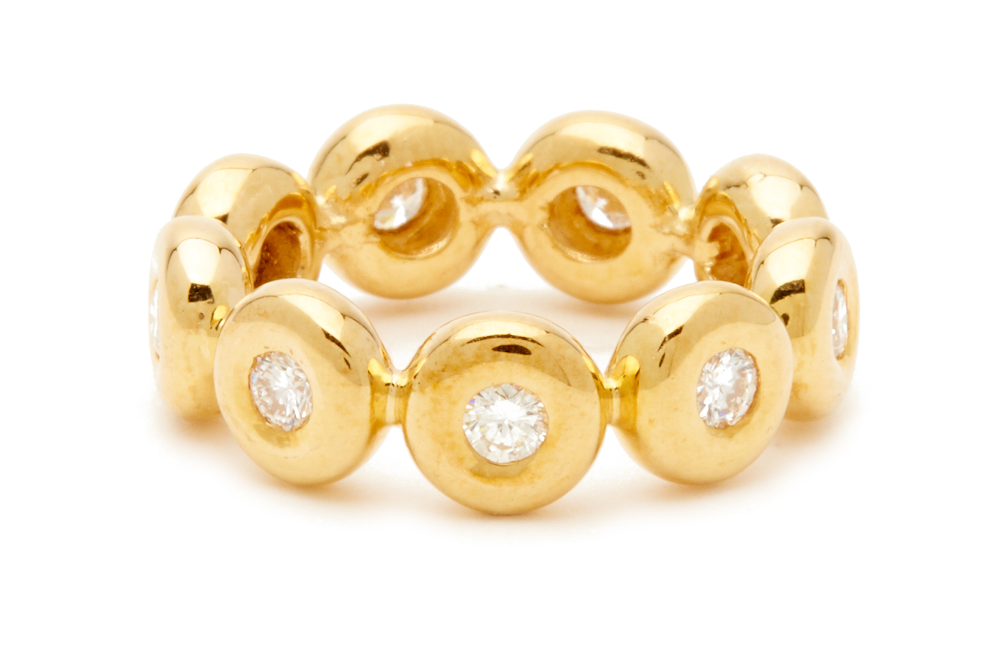 A YELLOW GOLD AND DIAMOND BEZEL SET RING