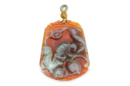 A CARVED HARDSTONE PENDANT