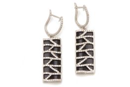 A PAIR OF ONYX AND DIAMOND DROP EARRINGS