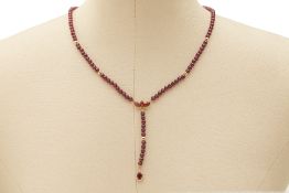 A GARNET AND DIAMOND NECKLACE