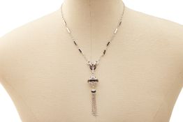 AN ONYX AND DIAMOND NECKLACE