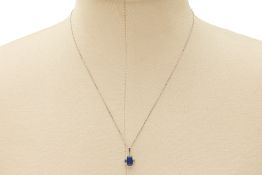 A PLATINUM, SAPPHIRE AND DIAMOND PENDANT NECKLACE