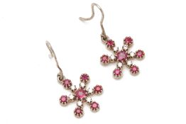 A PAIR OF RUBY AND DIAMOND SNOWFLAKE DANGLE EARRINGS