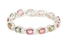 A WHITE GOLD, TOURMALINE AND DIAMOND BRACELET