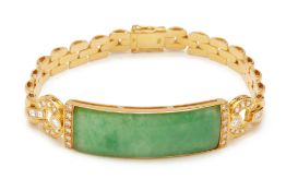 AN ANTIQUE CURVED JADE PLAQUE AND DIAMOND BRACELET