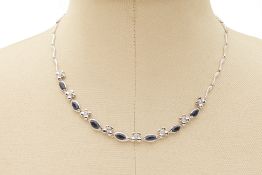 A WHITE GOLD, SAPPHIRE AND DIAMOND NECKLACE