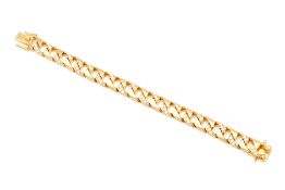 A YELLOW GOLD AND DIAMOND BRACELET