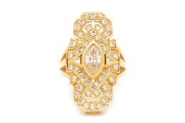 A GEOMETRIC YELLOW GOLD AND DIAMOND RING