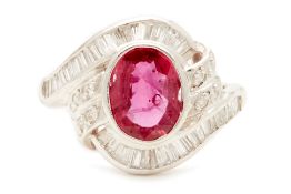 A PLATINUM TWIST, RUBY AND DIAMOND RING