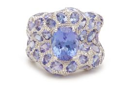 A TANZANITE AND DIAMOND RING