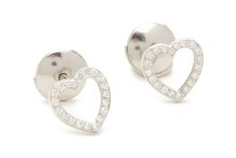 A PAIR OF PLATINUM HEART SHAPED DIAMOND EARRINGS