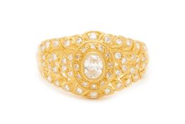 A 20K YELLOW GOLD OVAL CUT DIAMOND RING