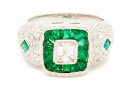 A PLATINUM, EMERALD CUT DIAMOND AND EMERALD RING