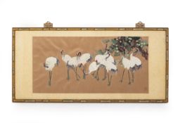 AN EMBROIDERY OF STORKS