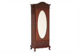 A SINGLE WARDROBE WITH OVAL MIRROR DOOR