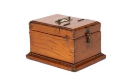 A BRASS HANDLED OAK BOX