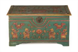 A CARVED AND PAINTED TRUNK