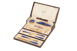 A GUILLOCHE ENAMEL MANICURE SET