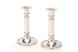 A PAIR OF GERMAN SILVER CANDLESTICKS