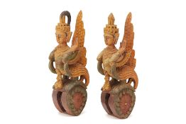TWO CARVED BURMESE WOODEN FIGURES