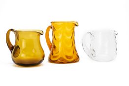 THREE VINTAGE GLASS JUGS