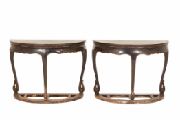 A PAIR OF ANTIQUE DEMI LUNE CONSOLE TABLES