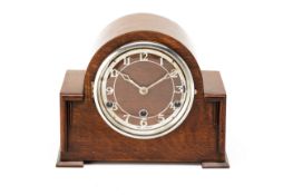 AN OAK CASED MANTLE CLOCK