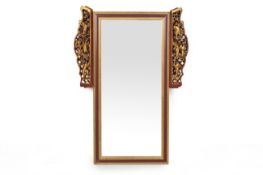 A CARVED GILTWOOD MIRROR (2)
