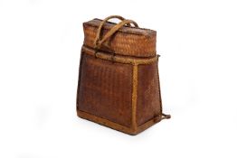 A RATTAN BACKPACK AND TWO OLD CANNISTERS