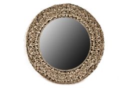 A LARGE CIRCULAR NICKEL MIRROR