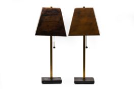 A PAIR OF METAL LAMPS