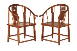 A PAIR OF CHINESE HORSESHOE ARMCHAIRS