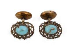 A PAIR OF TURQUOISE GLASS AND GILT METAL CUFFLINKS