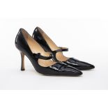 A PAIR OF MANOLO BLAHNIK BLACK PATENT LEATHER HEELS EU 38