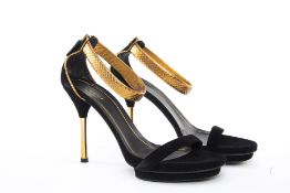 A PAIR OF GUCCI BLACK & GOLD STRAPPY HEELS EU 38