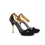 A PAIR OF GUCCI BLACK & GOLD STRAPPY HEELS EU 38